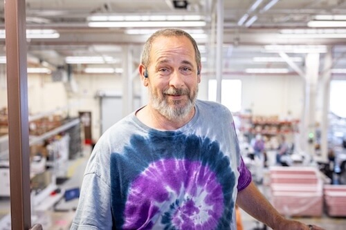 Cook Medical employee Franklin Williams poses in manufacturing area.