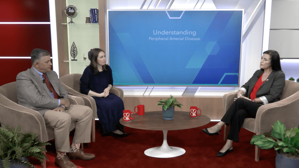 Dr. Peña and Dr. McMackin sitting in a conference room with host Caroline Jackson discussing navigating complex PAD cases.